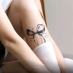 Whimsical Bow Tattoo