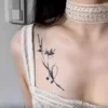 Delicate stem and flower temporary tattoo artwork