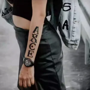 Stacked A&CE typographic temporary body art